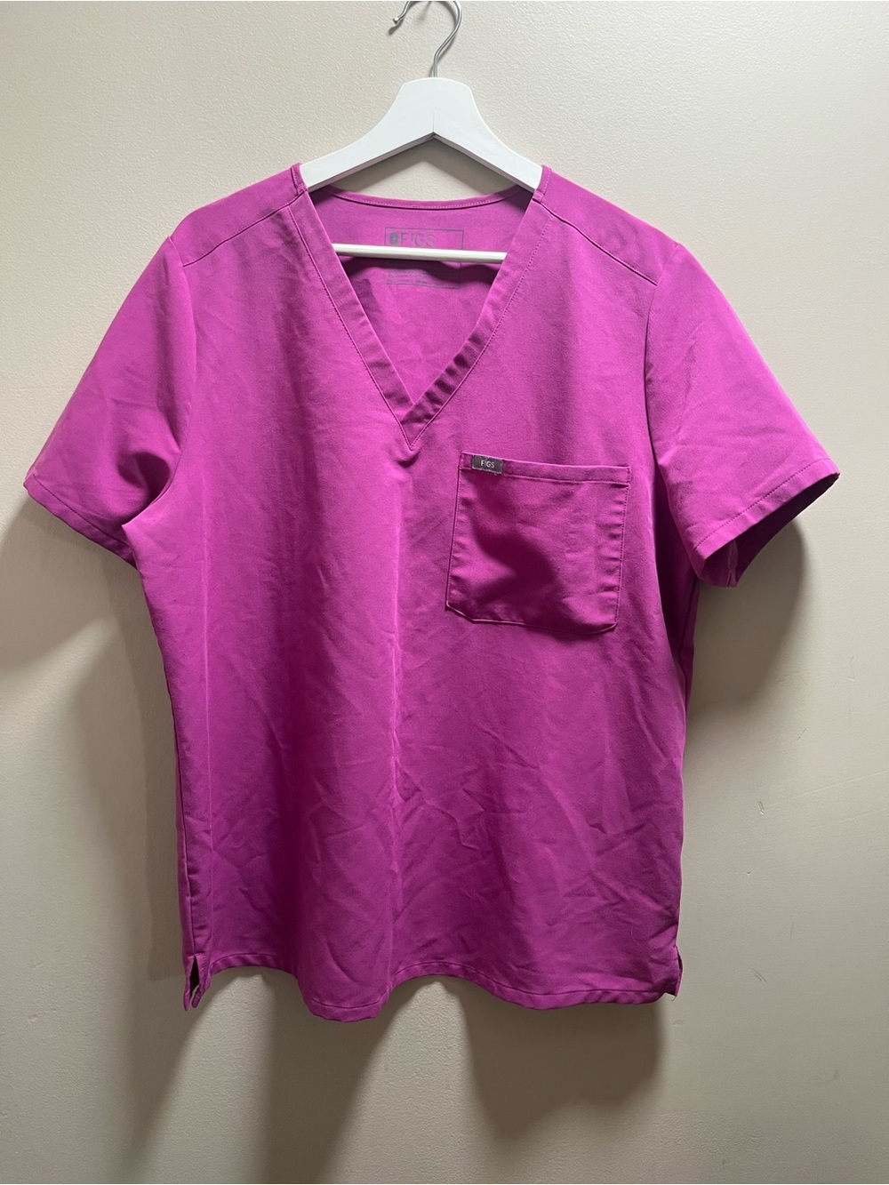 Figs Technical Collection V-Neck Short Sleeve Scrub top in Magenta.